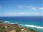 Peering out at the pacific ocean from the summit.  And another bunker.