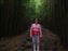 The trail runs through this bamboo forest.  Here's Nancy in the forest.