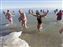 This lady in the black tank top gave me a High-Five when I first entered the water.  I'm the one on the right in the red shirt.